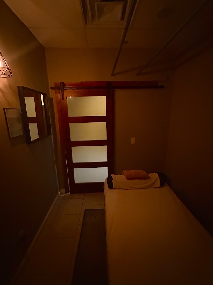 Private, softly lit massage room